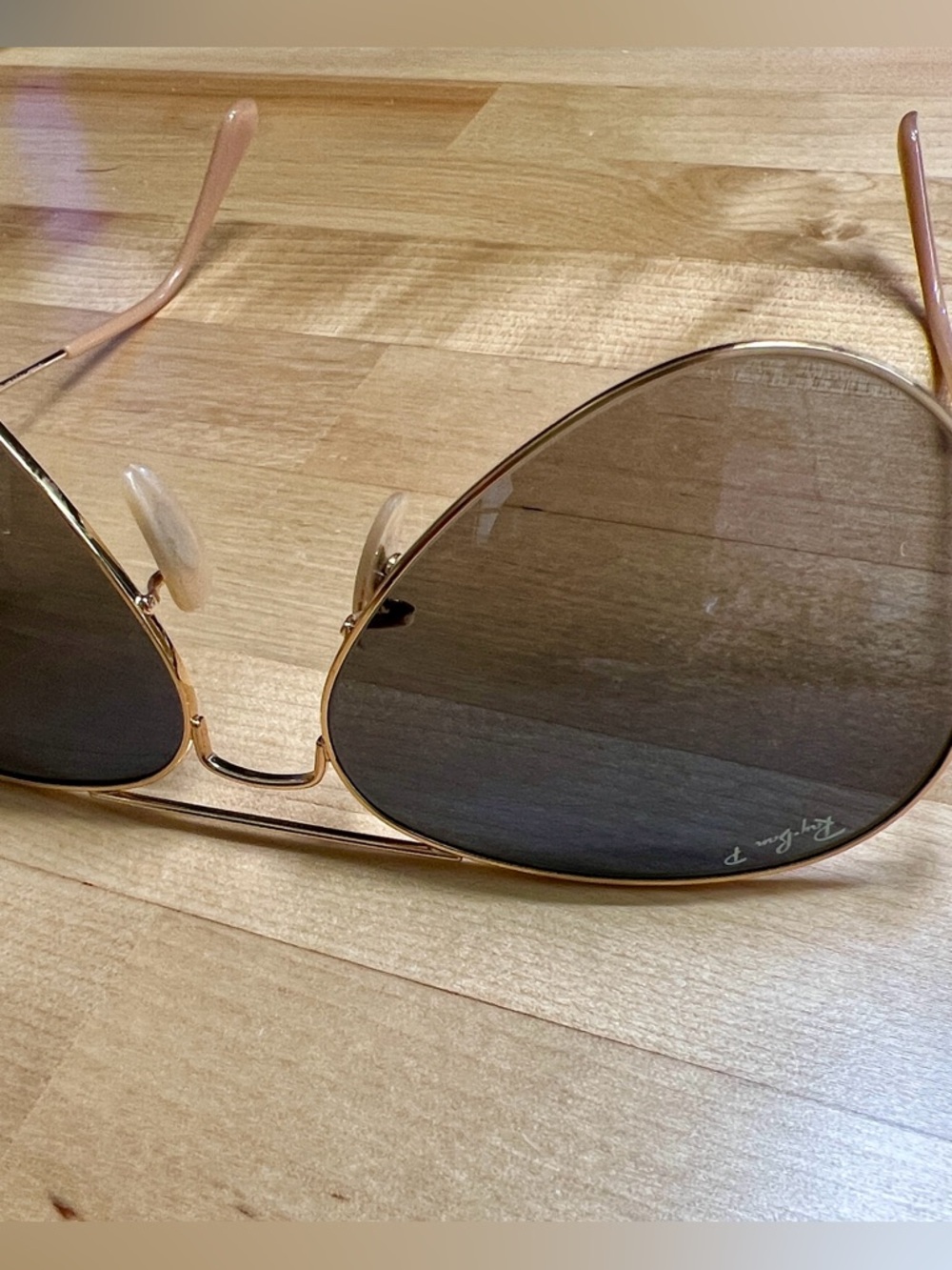 Ray-Ban Polarized Aviators with Gold Frame & Purple/Gray Gradient Lenses.
